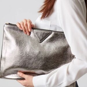 Luxurious SILVER Metallic Clutch with Sleek Design (NWOT)